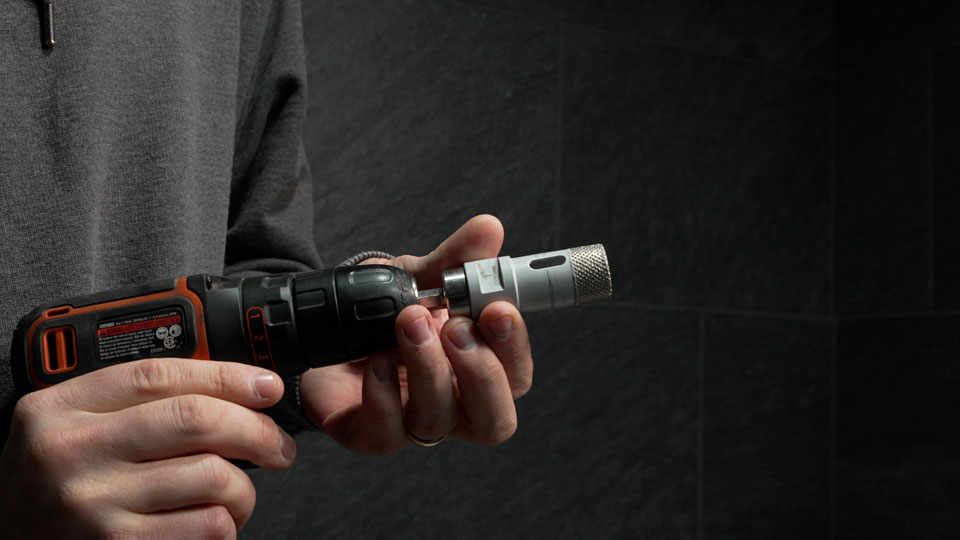 attaching diamond hole saw to a drill with the drill adapter
